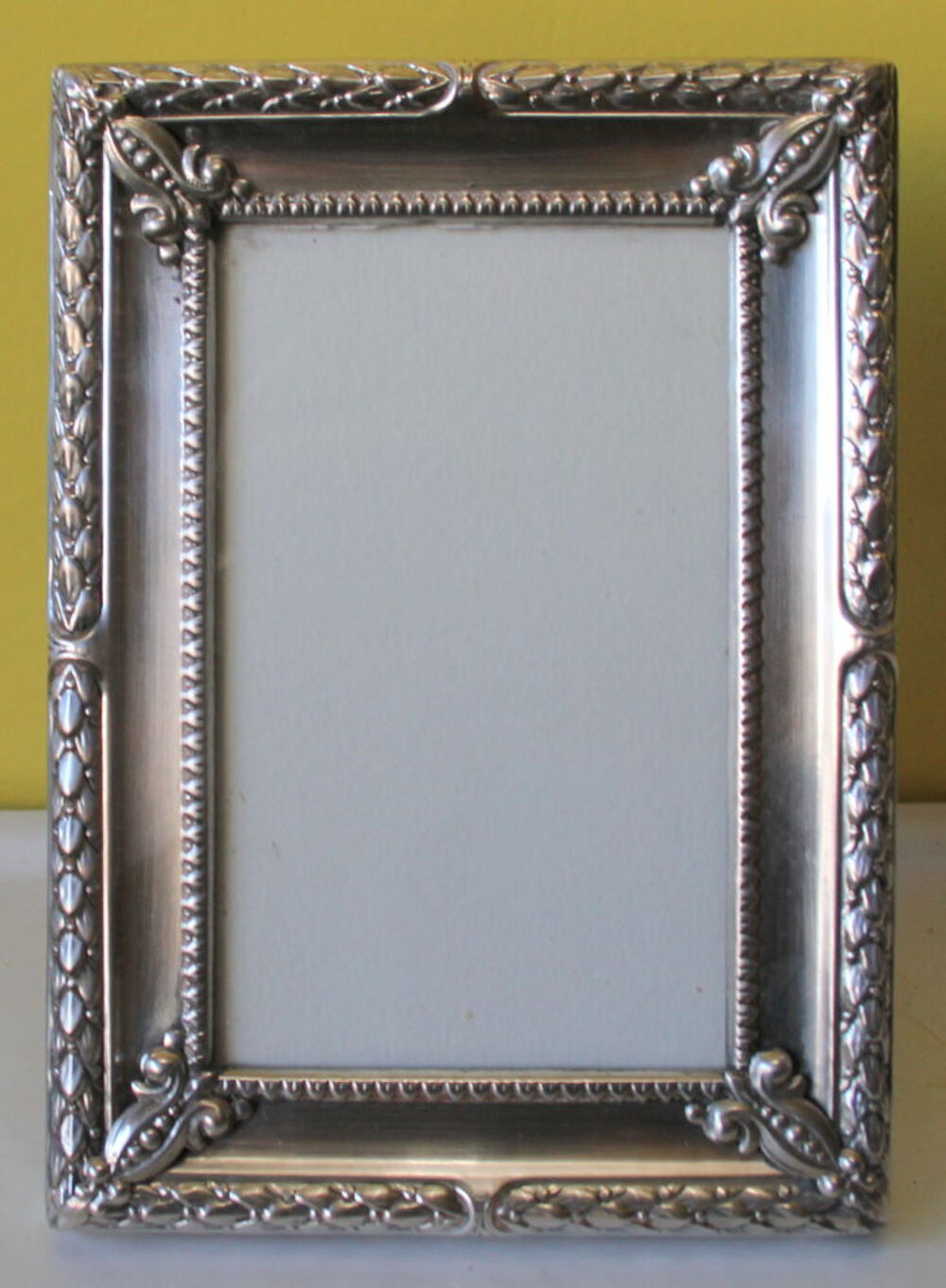 Cadre photo argent massif repouss&eacute; style Louis XVI
Décoration