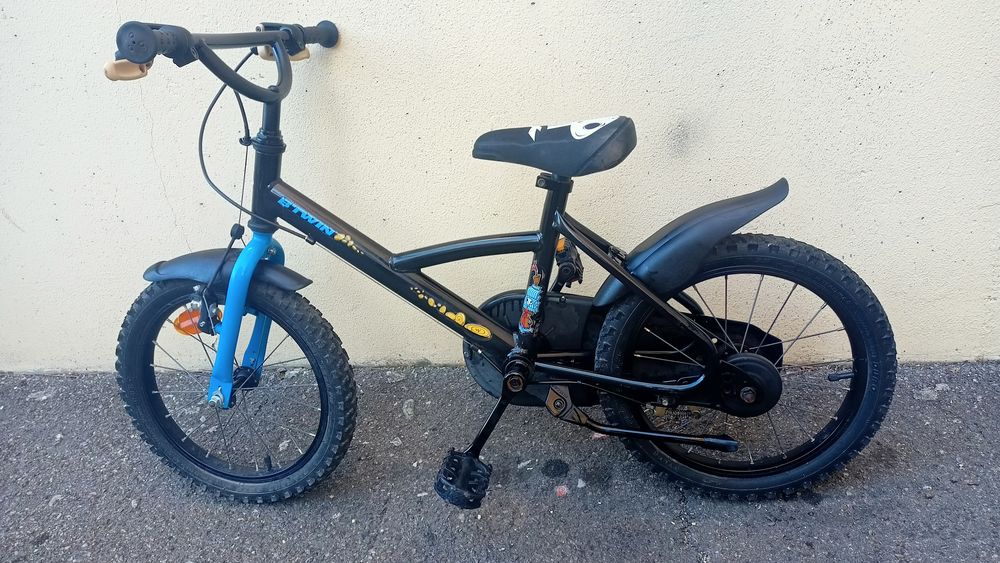 velo 16 pouces noir et bleu Vélos