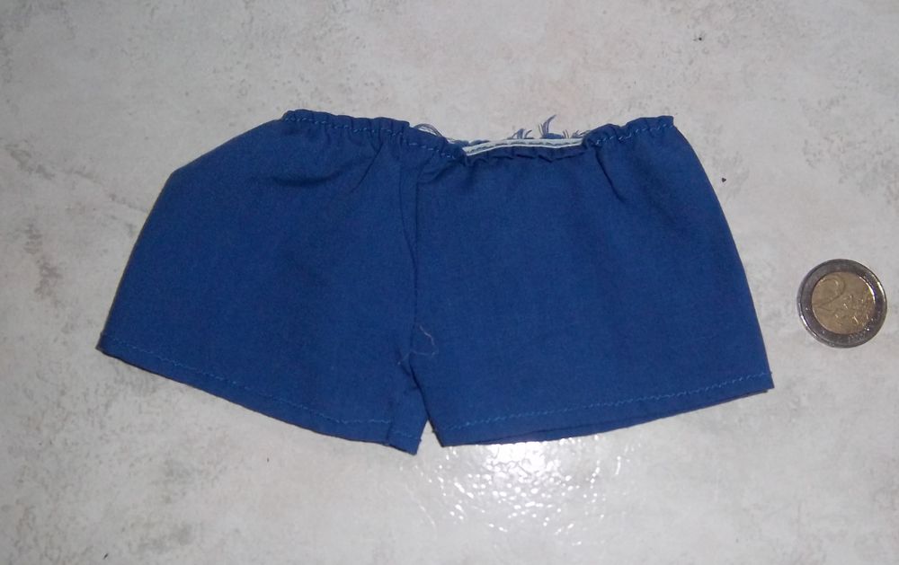 Short bleu poup&eacute;e Jeux / jouets