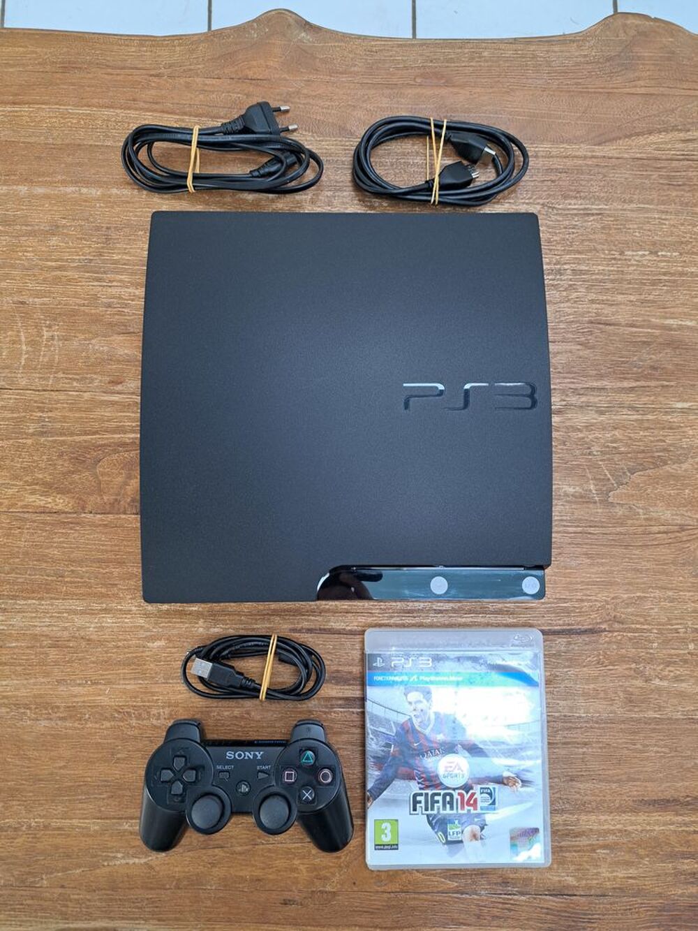 Console PS3 slim noire + manette officielle + jeu Consoles et jeux vidéos