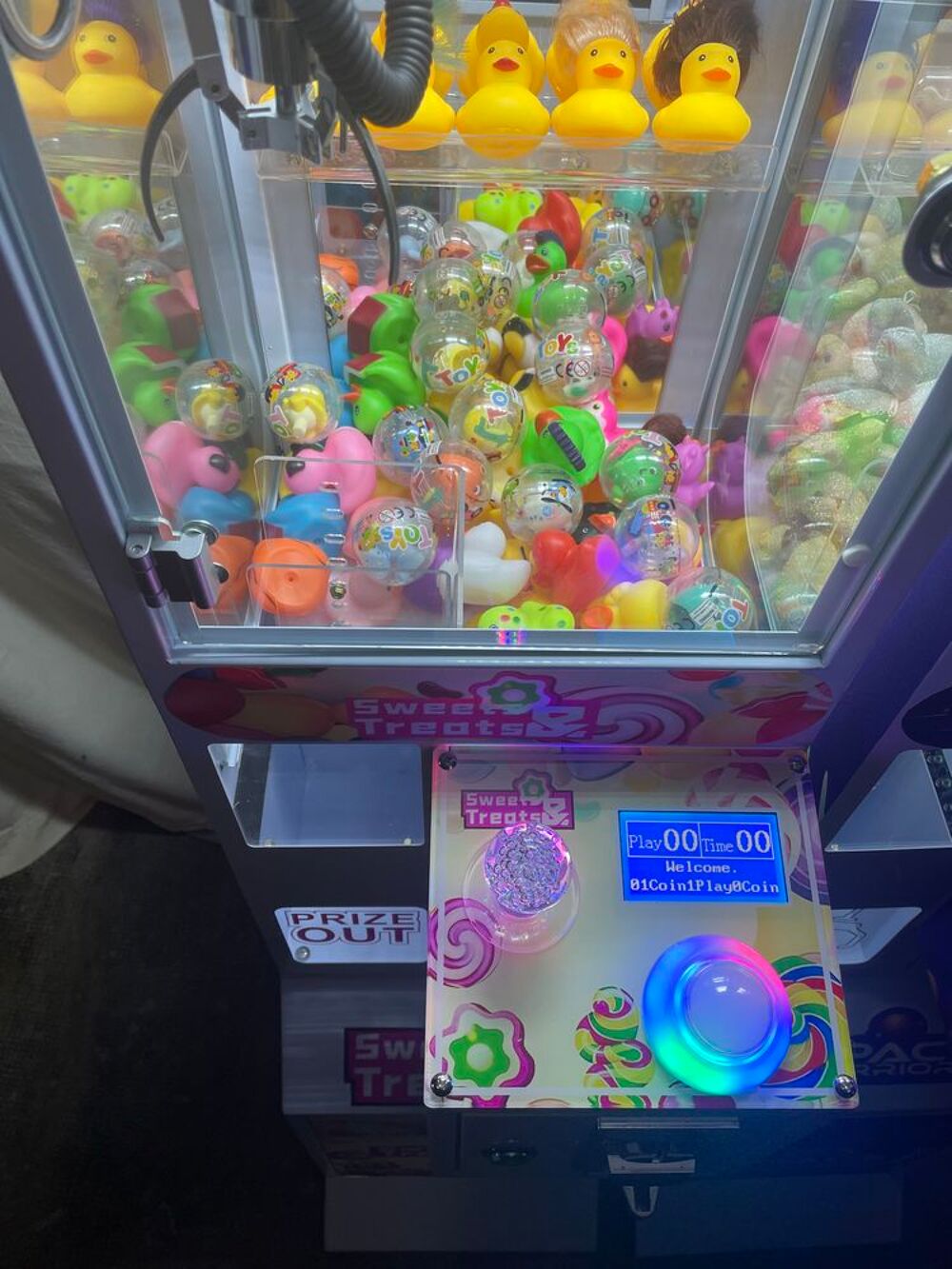 Machine &agrave; pince attrape peluche Jeux / jouets