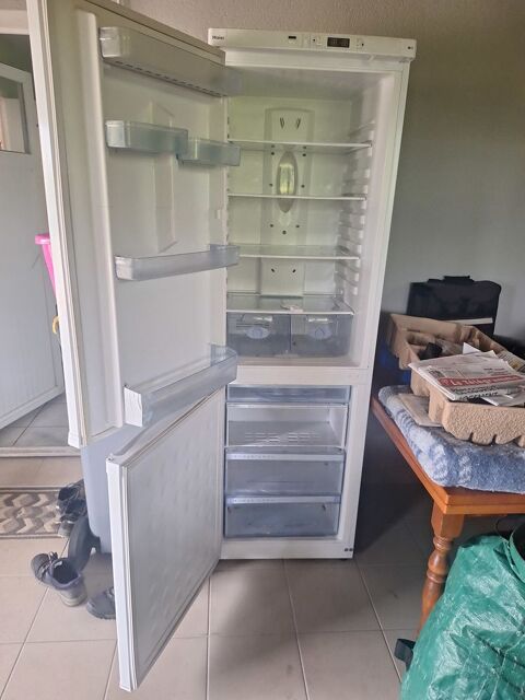 Combiné .frigo. congélateur. 100 Guipronvel (29)