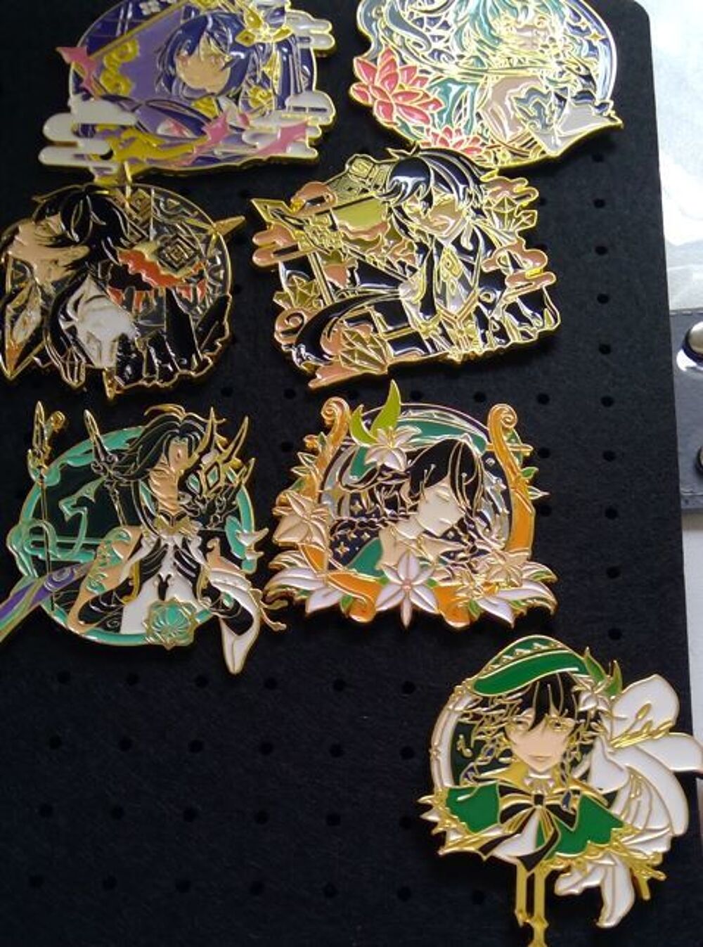 12€ M&eacute;dailles / pins Genshin Impact
Jeux / jouets