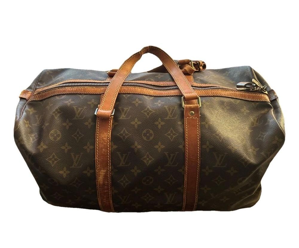 superbe sac de voyage vintage Louis Vuitton Maroquinerie