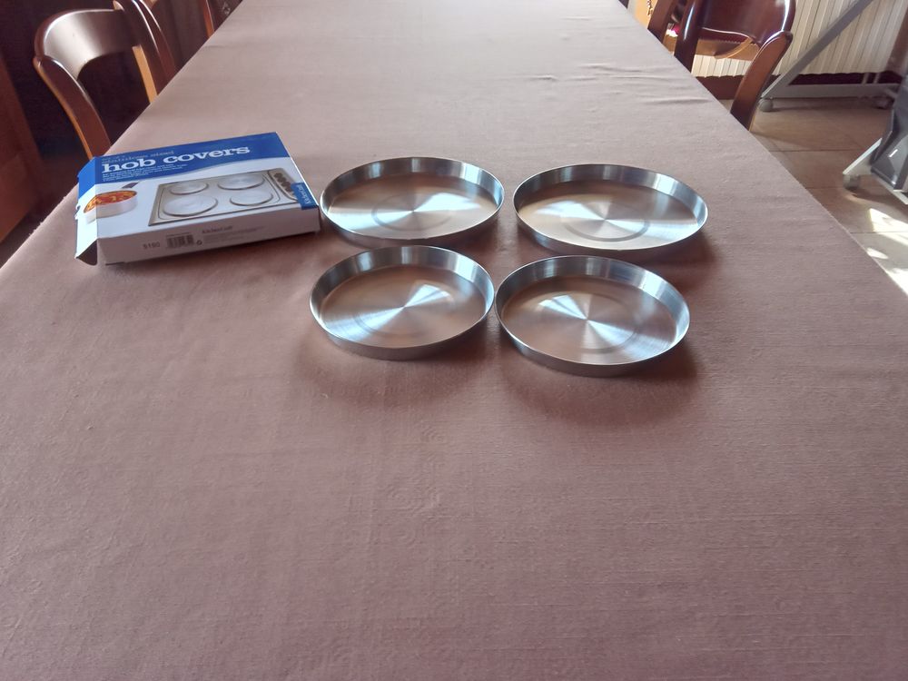 Jeu de 4 protections neuves pour plaques de cuisson. Electroménager