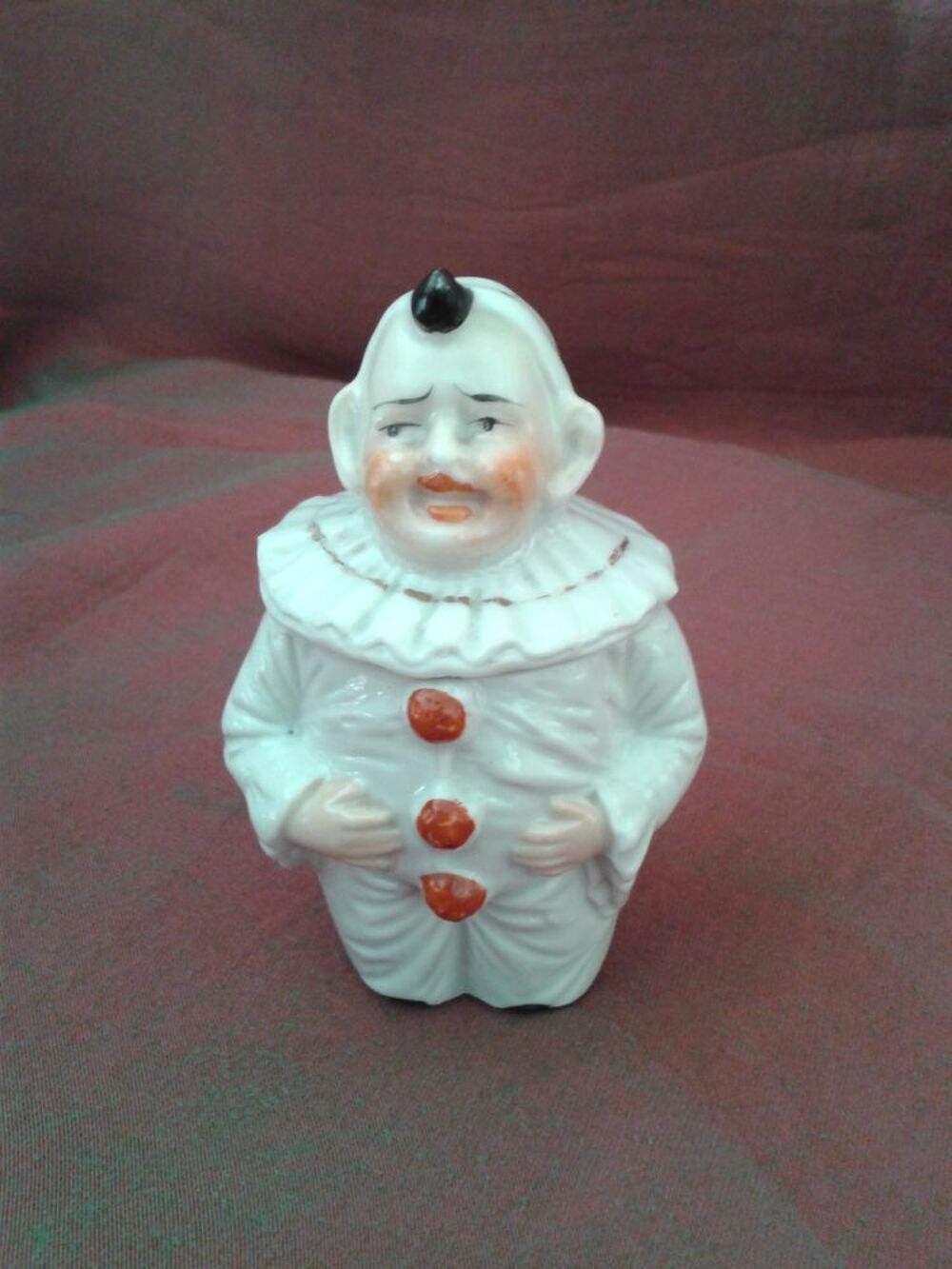 Moutardier ancien en porcelaine en forme de pierrot 