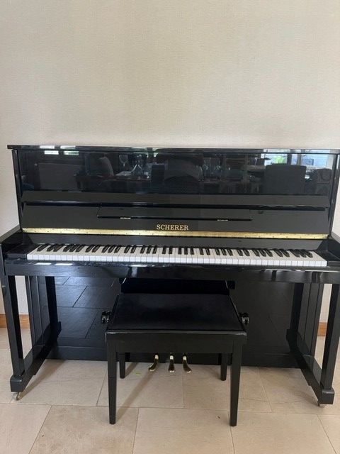 d'un piano noir laqu Sherer parfait tat 1500 Morigny-Champigny (91)
