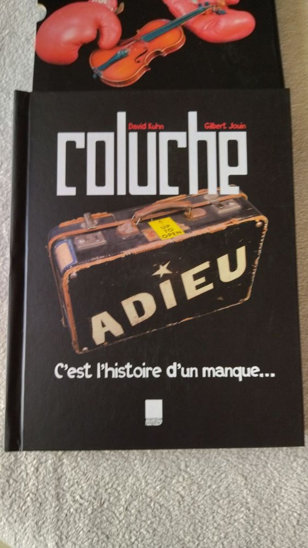Coluche . Livres et BD