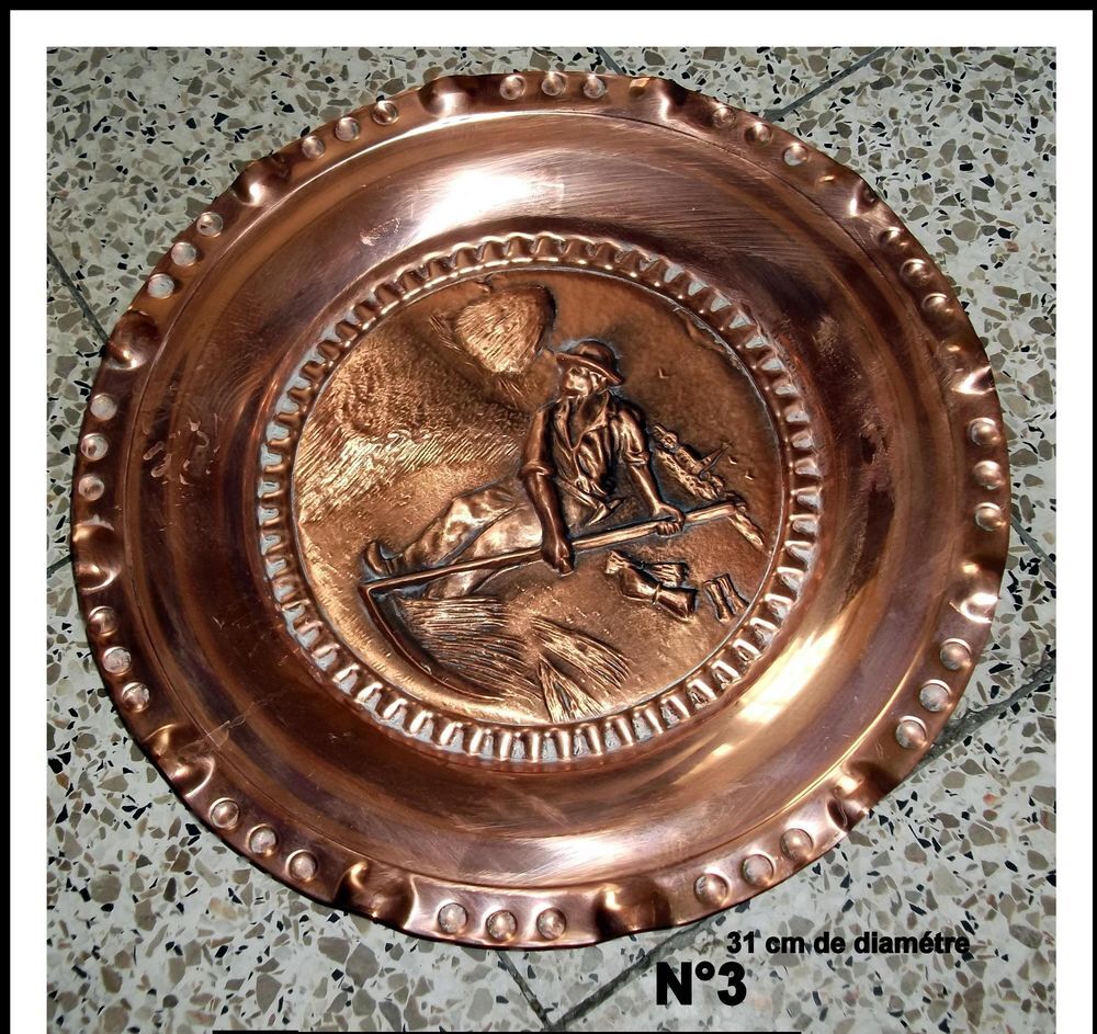 assiette en cuivre le faucheur. 