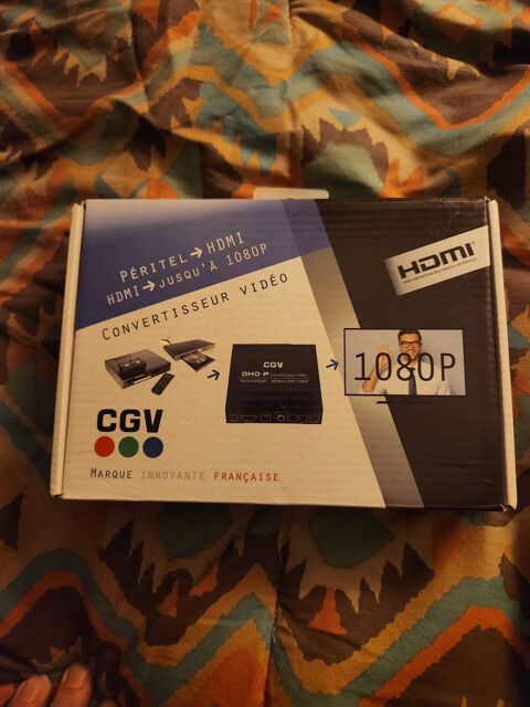 convertisseur vido avec une entre peritel derrire et une sortie HDMI devant pour pouvoir lire des VHS sur tlviseur rcents. 35 Crmieu (38)