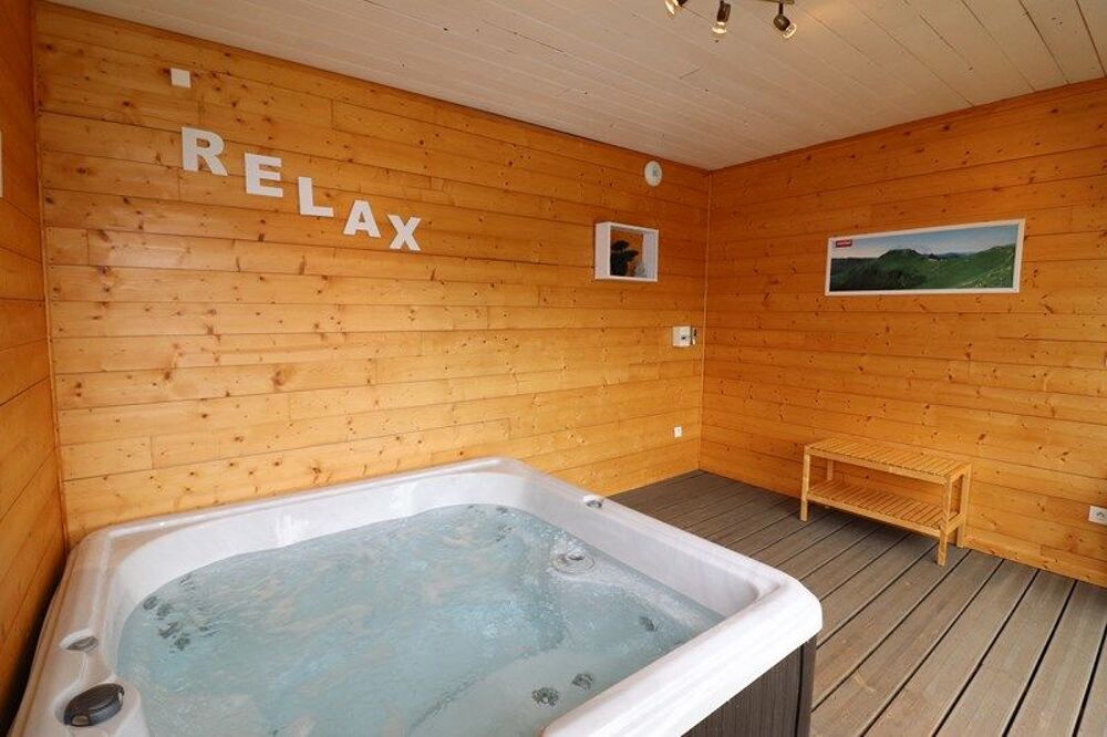   Grand chalet bois tout confort avec spa Vacances  / Offres de location 