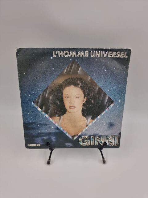 Vinyle 45 tours Ginni : L'Homme Universel avec fourreau  1 Vulbens (74)