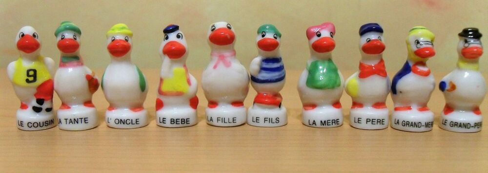 Lot de 10 F&egrave;ves Famille des oies Pasquier en C&eacute;ramique 