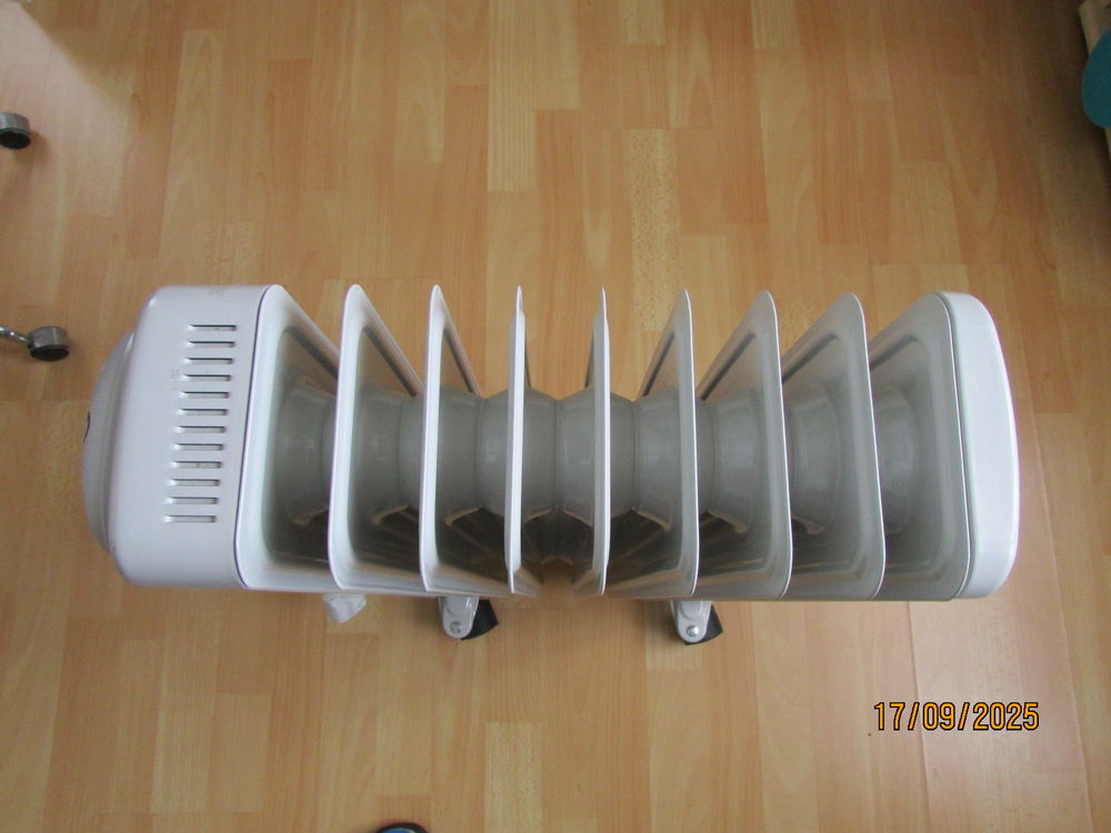 Radiateur &eacute;lectrique &agrave; circulation d'huile. 
Electroménager