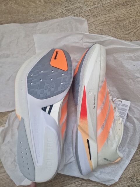 Chaussures running blanches et orange 70 Nantes (44)