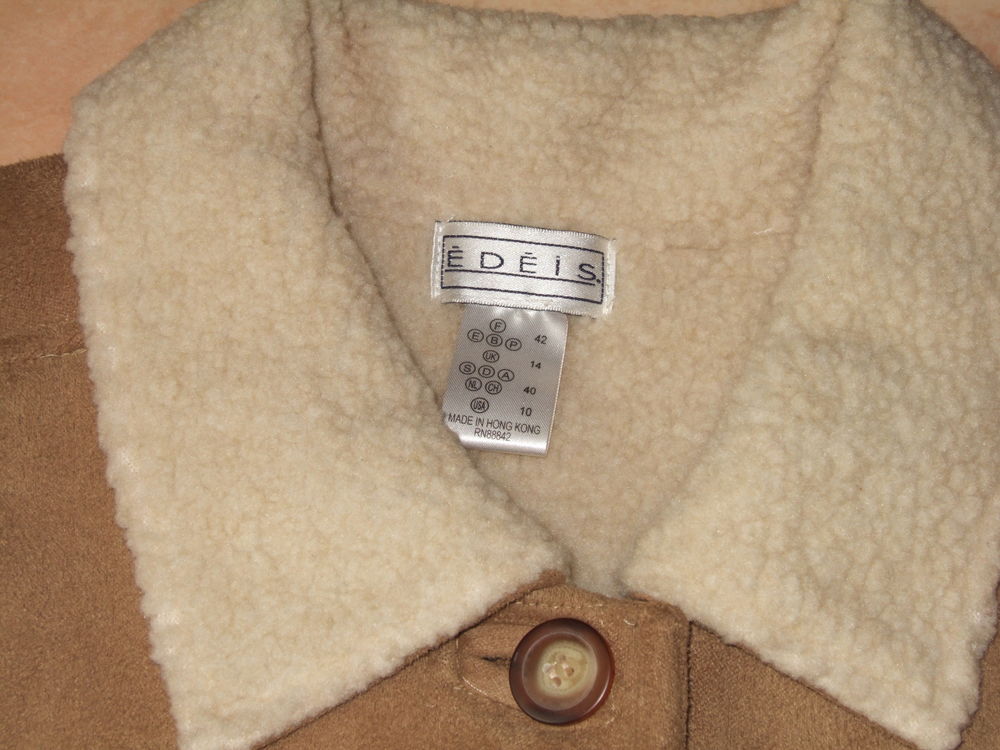 Manteau imitation peau retourn&eacute; T. 42/44 ( neuf) Vêtements
