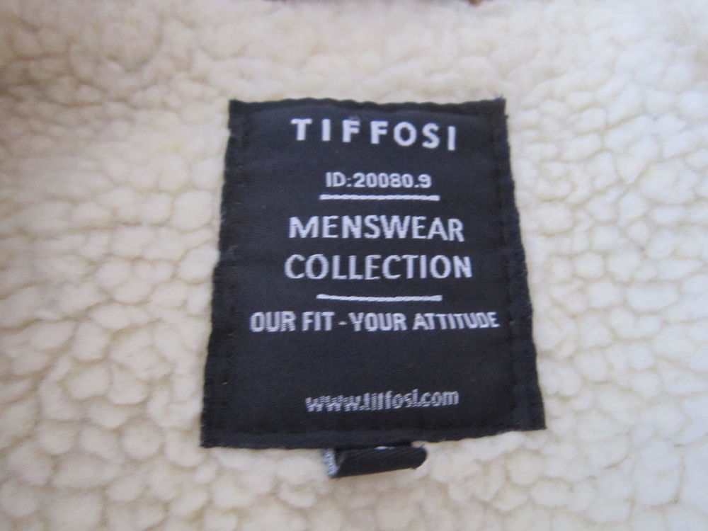 Un blouson Homme Vêtements
