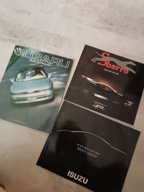 Revue  brochures automobile 15 Cly (77)
