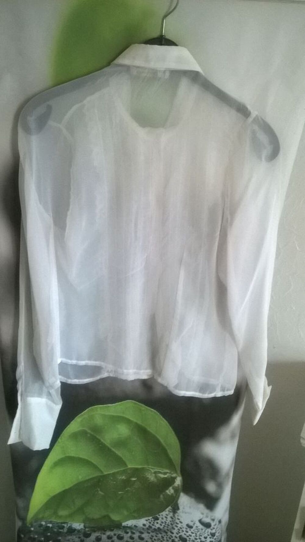 Chemisier blanc transparent
Marque GI and JO
Taille 36
Vêtements
