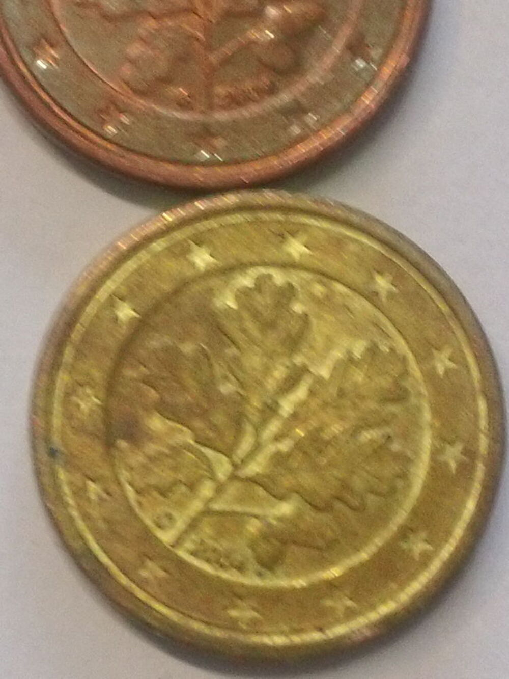 piece de1 euro cent.allemand 2004 D de couleur jaune tres ra 