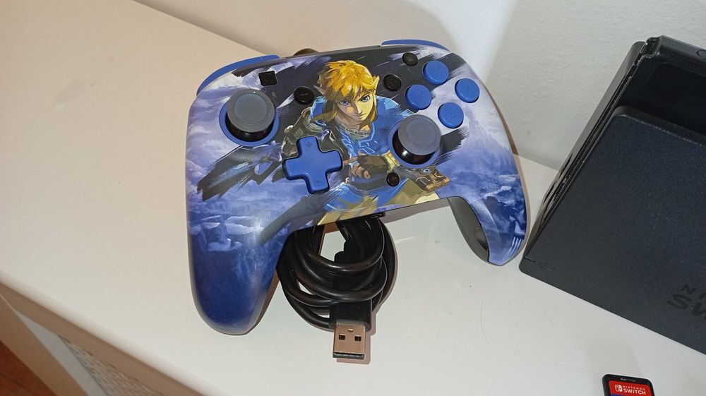 Switch et 2 Jeux Manette Zelda Consoles et jeux vidéos