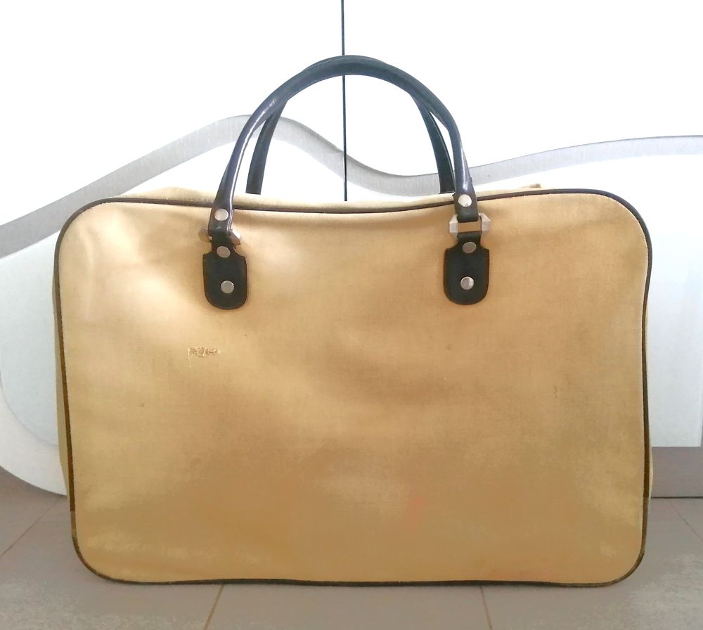 Valise en toile beige et cuir Maroquinerie