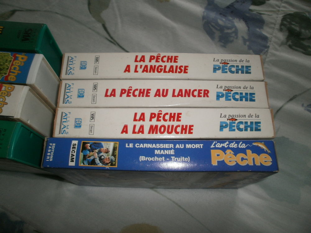 lot de cassettes vid&eacute;o sur la peche Photos/Video/TV