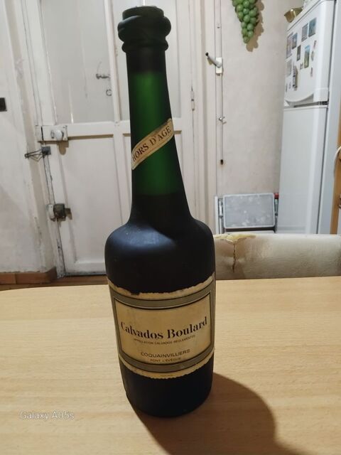 ANCIENNE BOUTEILLE DE CALVADOS BOULARD COQUAINVILLIERS Enghien-les-Bains (95)
