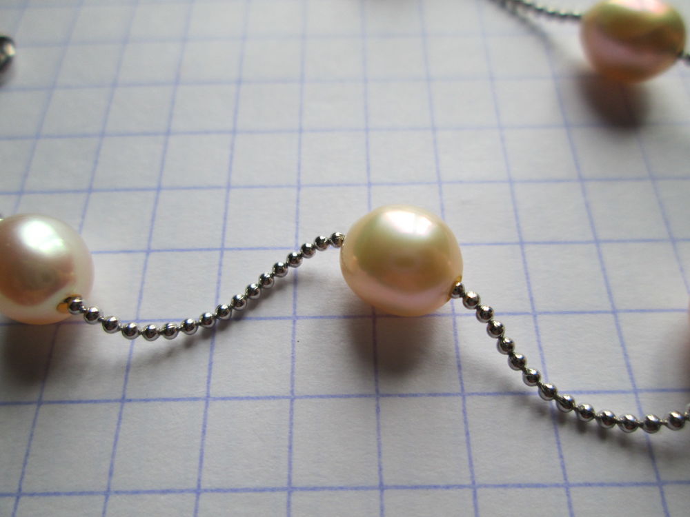 Bracelet perles fantaisie couleur cr&egrave;me ros&eacute;e et argent&eacute; Bijoux et montres