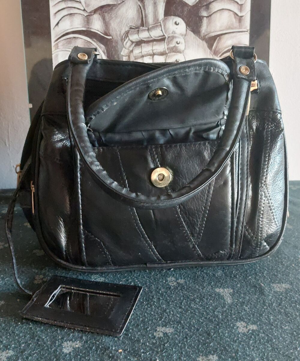 Sac &agrave; main noir patchwork cuir et PVC Maroquinerie