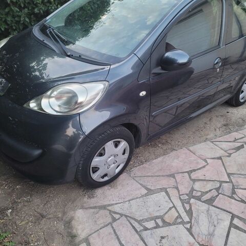 Peugeot 107 1.4 hdi 5 portes.  D.a vitres &eacute;le