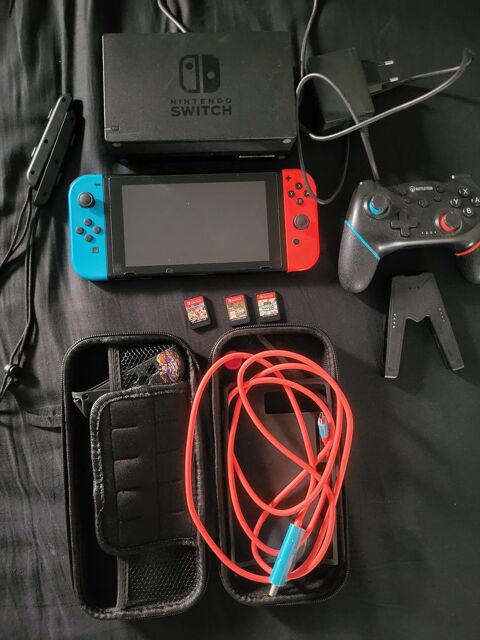 Nintendo switch v2 + 3 jeux et manettes Montpellier (34)