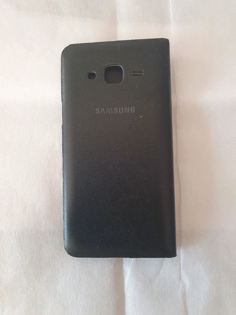 &Eacute;tui samsung noir 
T�l�phones et tablettes