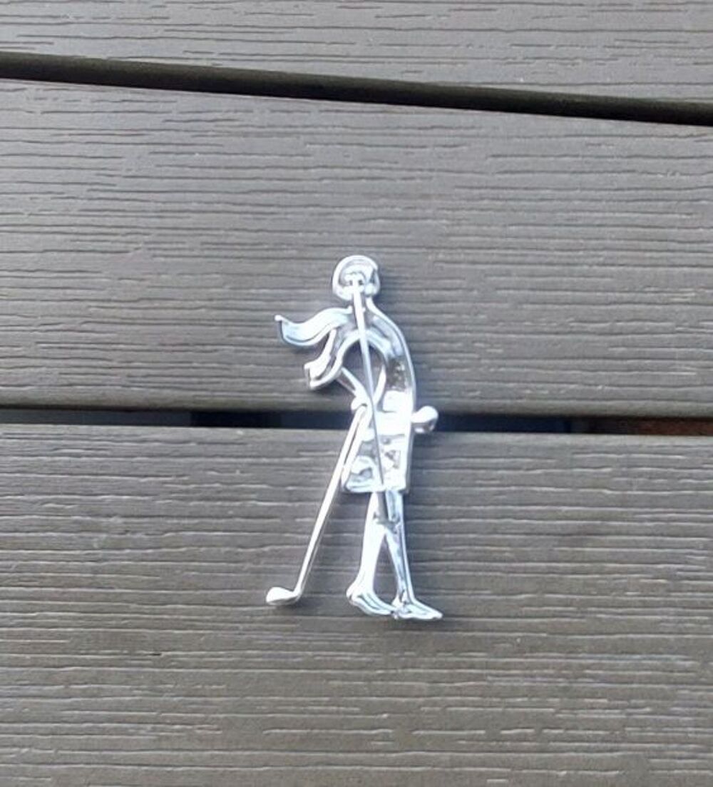  Broche golfeuse en rodhium, Bijoux et montres