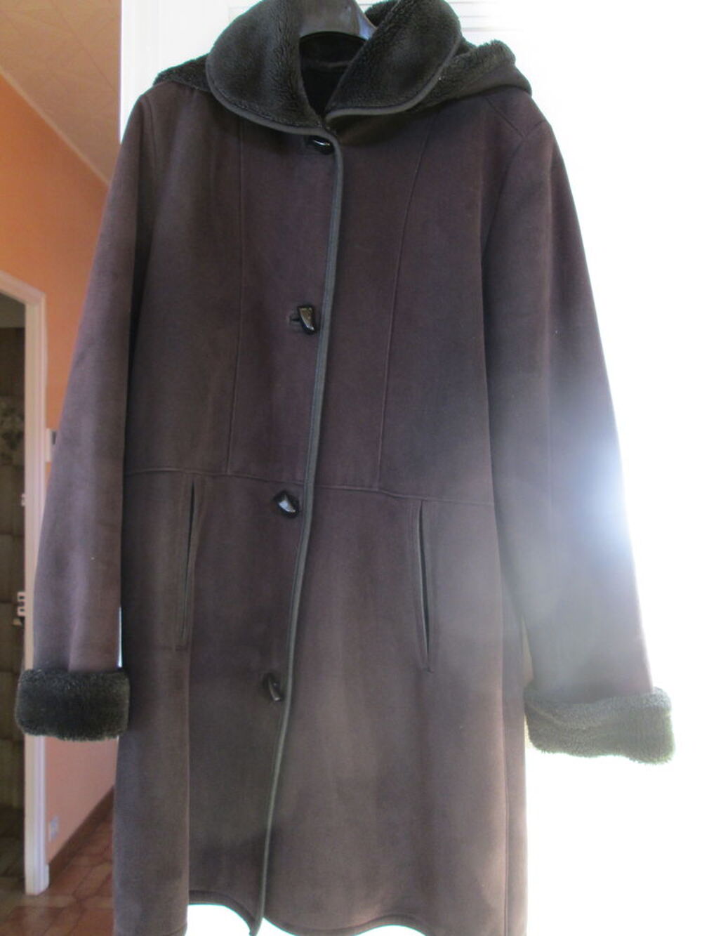 manteau en peau retourn&eacute;e Vêtements