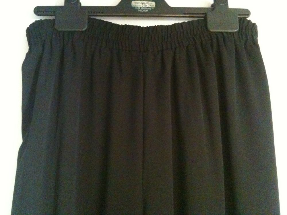 Pantalon noir. Vêtements