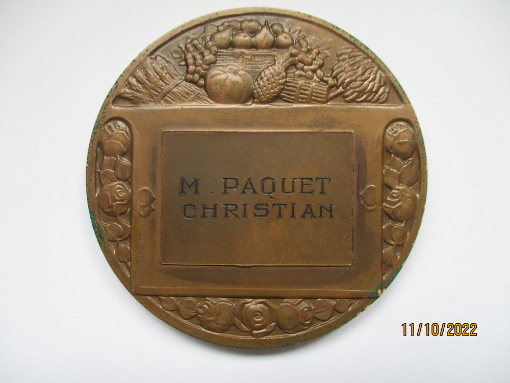 M&eacute;daille en bronze COMMERCE sign&eacute;e Raswmny poin&ccedil;on "corne" 