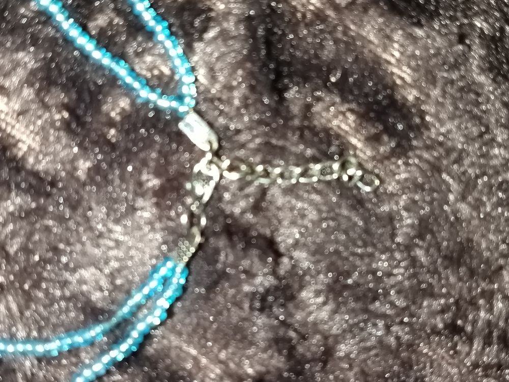 Colliers deux niveaux coquillages et perles turquoise Bijoux et montres