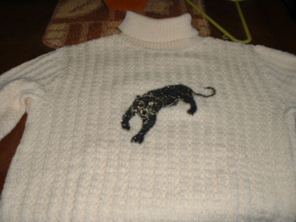 Pull col roul&eacute; Vêtements