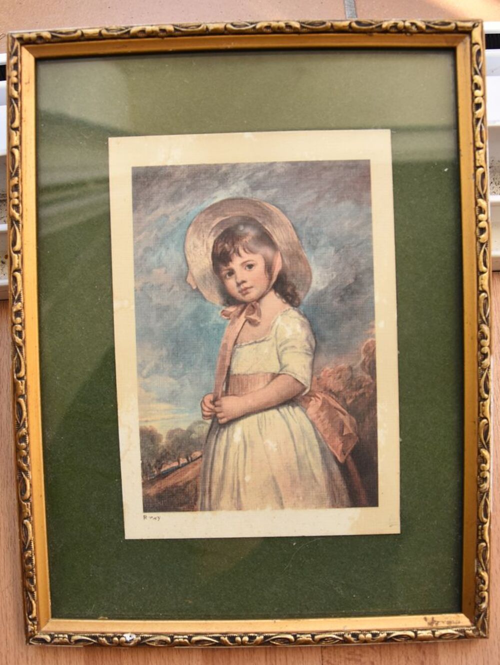 Cadre dor&eacute; avec jolie petite fille. 25.5 cm. Tbe. 20 euros Décoration