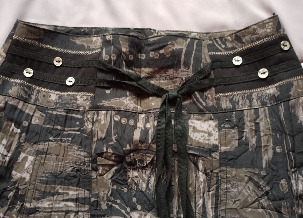 Jupe &eacute;l&eacute;gante avec motifs marron et noirs Vêtements