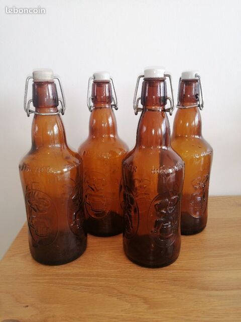 4 BOUTEILLES DE BIERE MARQUE FISCHER
BOUCHONS AUTENTHIQUES  12 H�ches (65)