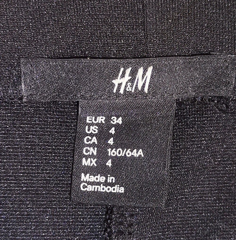 Jupe noire extensible en polyester H&amp;M taille 34 Vêtements