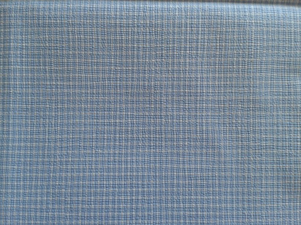 Tissu gauffr&eacute; bleu layette Décoration