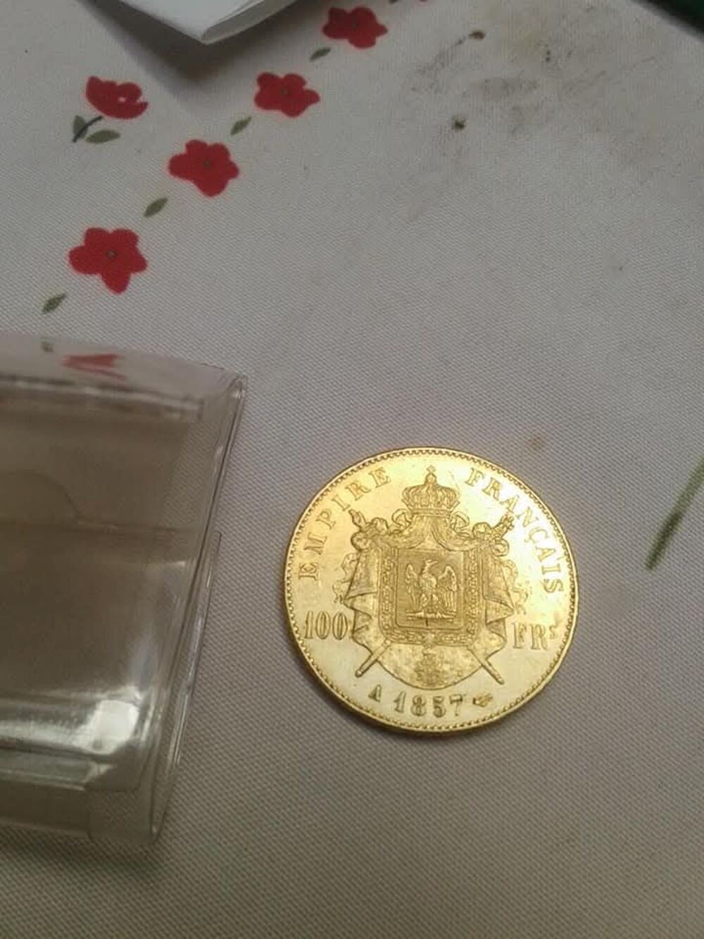 Pi&egrave;ces de 100 francs or Napol&eacute;on III t&ecirc;te nue A 