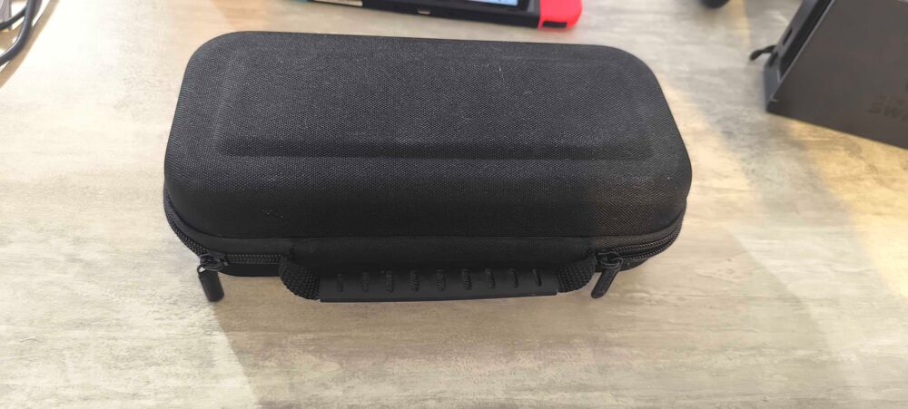 Nintendo Switch+ pochette de transport Consoles et jeux vidéos