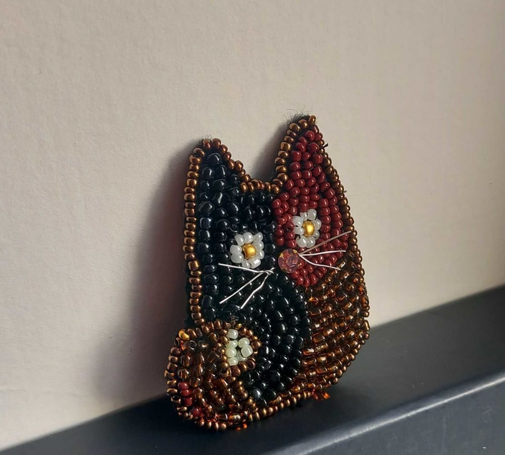 broche chat en perles Bijoux et montres