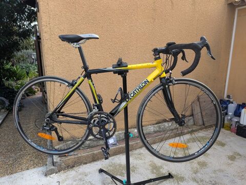 Vélo de route Decathlon jaune et noir 60 Carros (06)