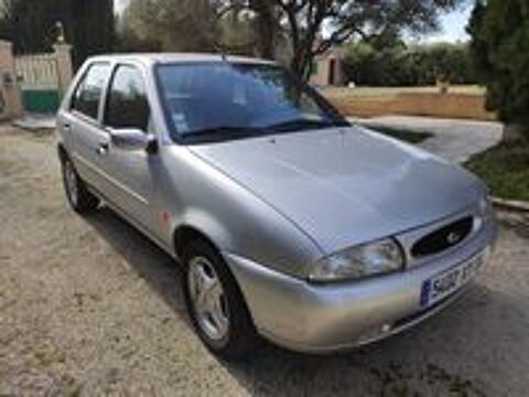 Fiesta 1.2i Ghia 1999 occasion 84100 Orange