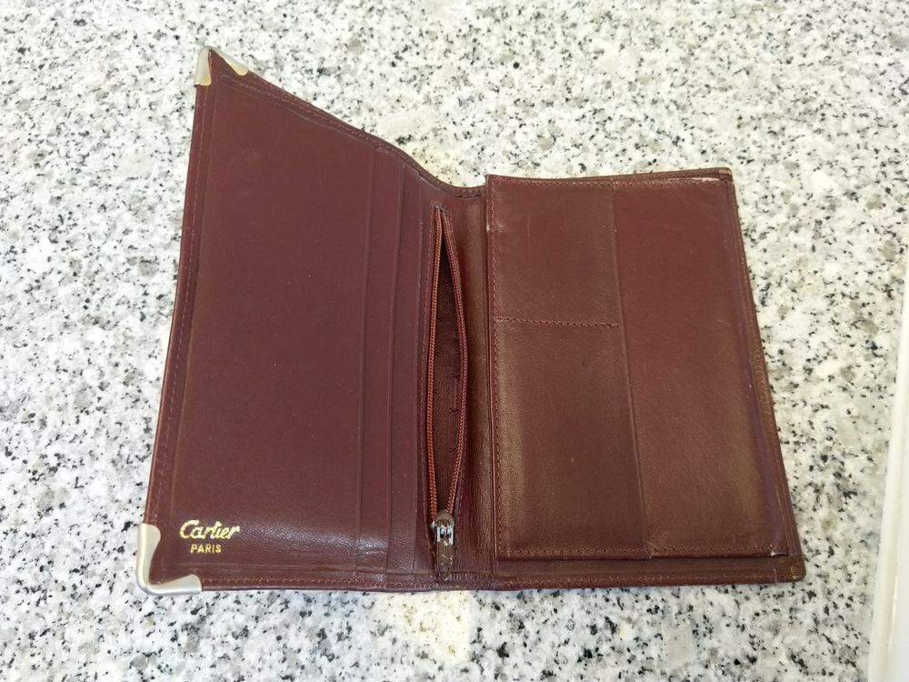 Portefeuille en cuir Cartier
Maroquinerie